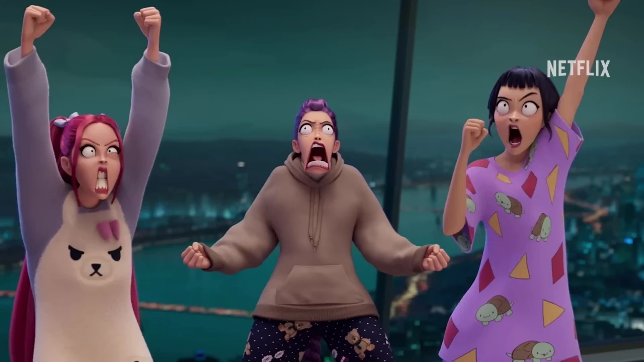 The Huntrix members reacting in their apartment, a still from KPop Demon Hunters