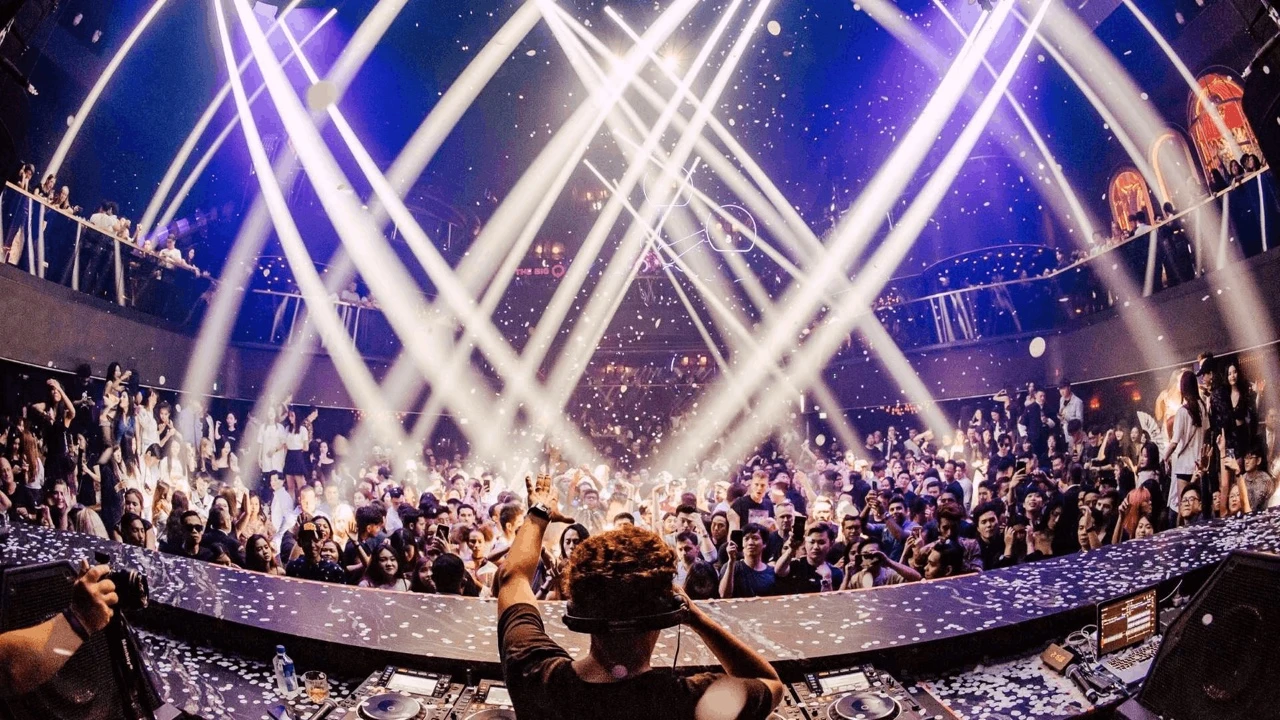 MARQUEE Singapore nightclub during a packed event with lasers and confetti