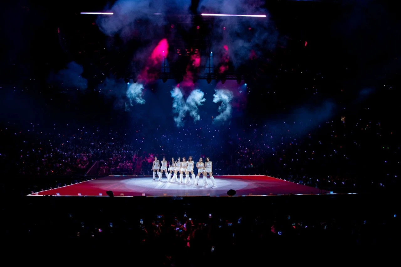 TWICE performing on stage at UBS Arena with pyrotechnics and CO2 effects during the THIS IS FOR World Tour