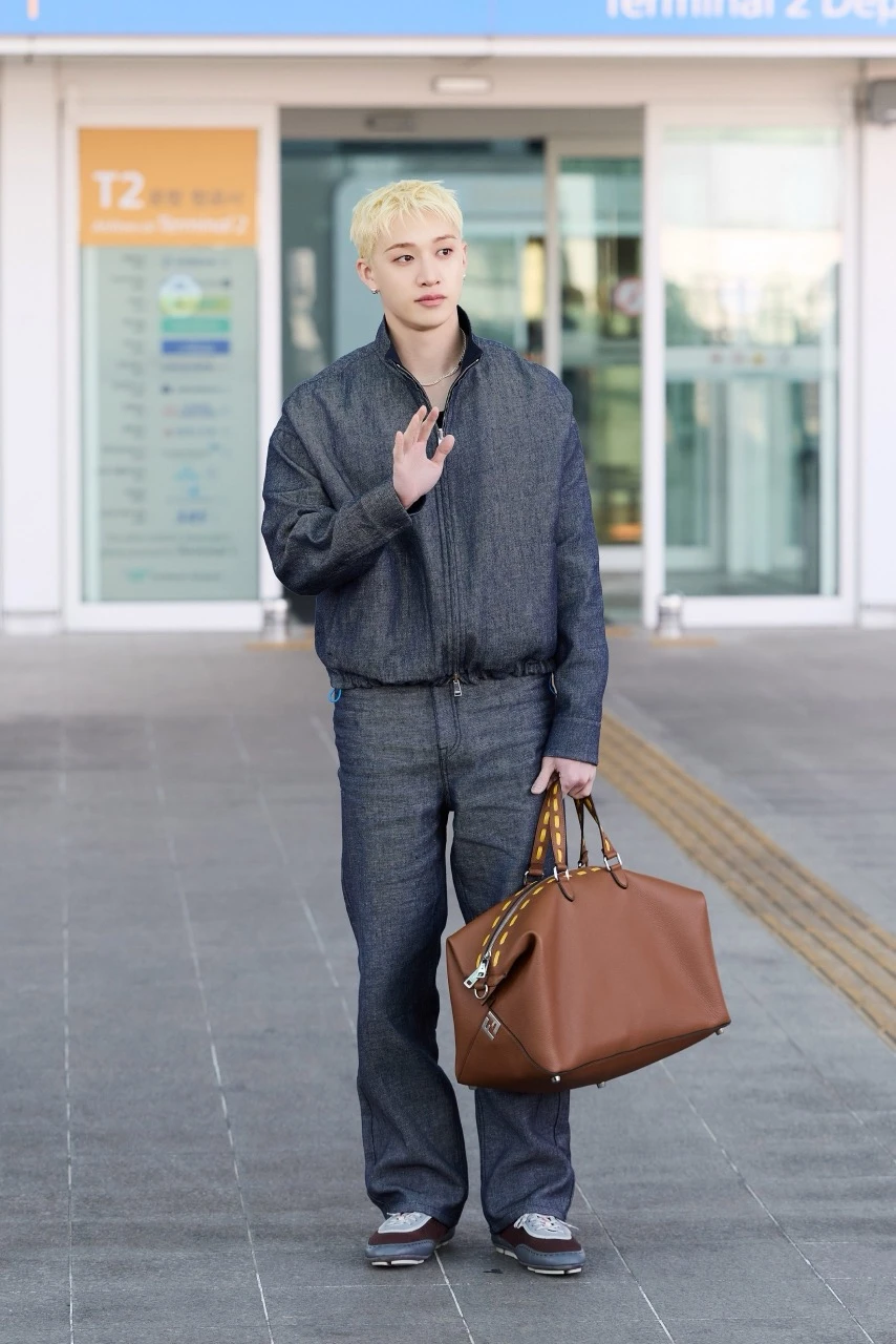 Bang Chan of Stray Kids in full Fendi look departing for Milan Fashion Week FW26