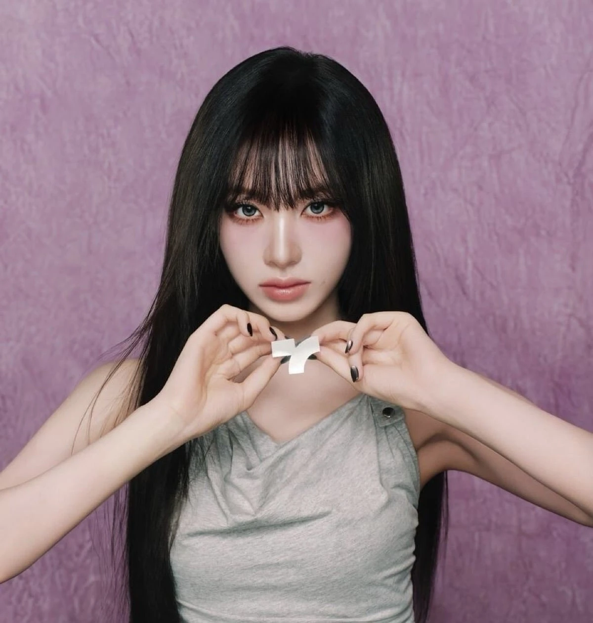 Liz in TONYMOLY The Sparkle of Liz campaign against a lavender backdrop