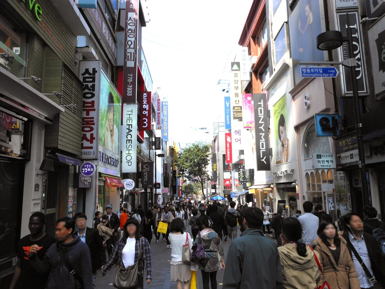Myeongdong shopping street in Seoul, lined with K-beauty stores and visitors