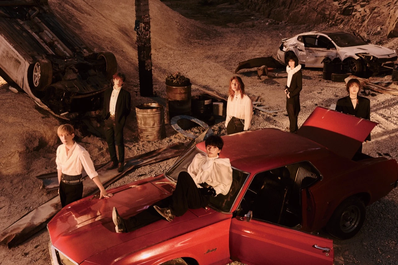 Xdinary Heroes official concept photo, six members in dramatic outdoor setting