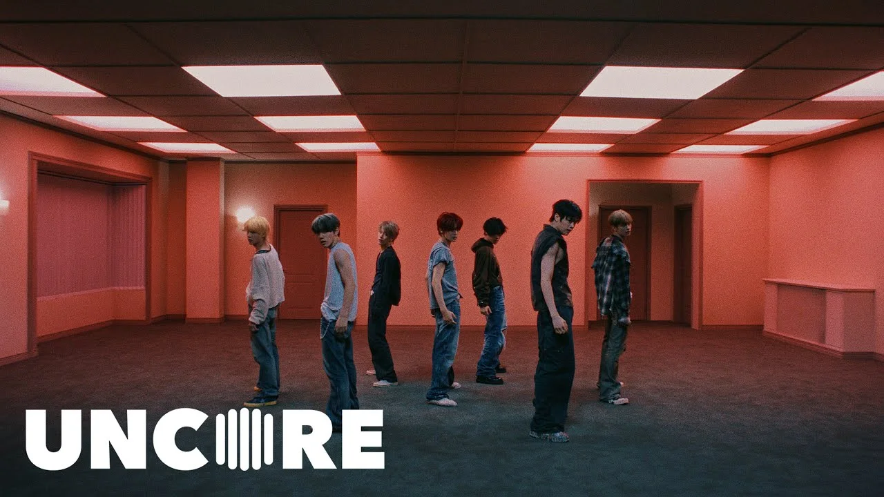 Close Your Eyes performing X from their Blackout mini-album in a moody red-lit set, 2025