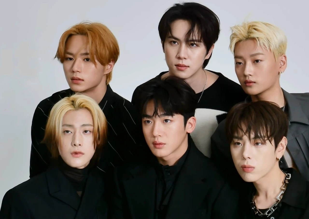 WEi group photo from Marie Claire Korea photoshoot, six members in coordinated black outfits