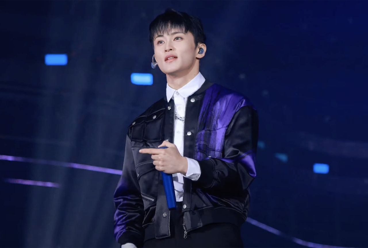 Mark Lee performing at a concert in December 2024