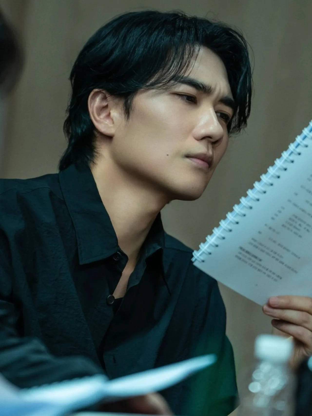 Park Seo Joon reading the Born Guilty script at the official table read for the Disney+ crime noir drama