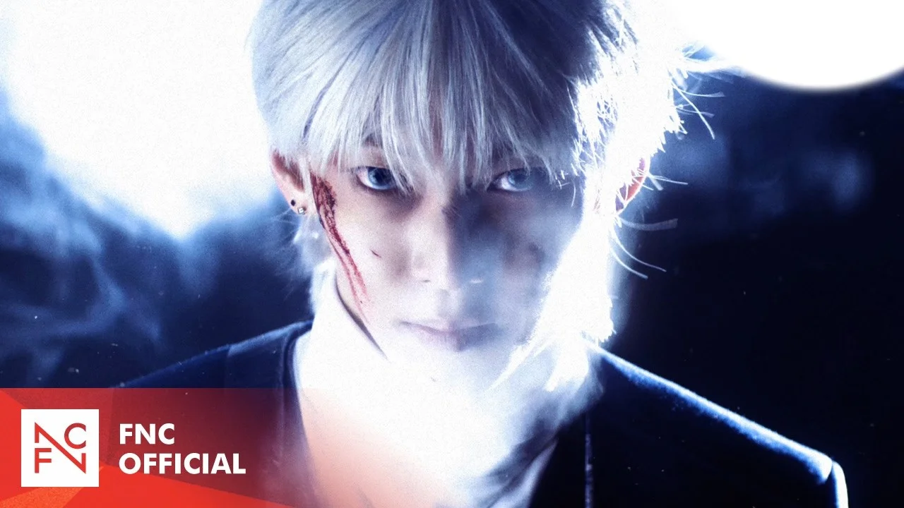 A member of AMPERS&ONE in a blue-lit official teaser image for the God comeback
