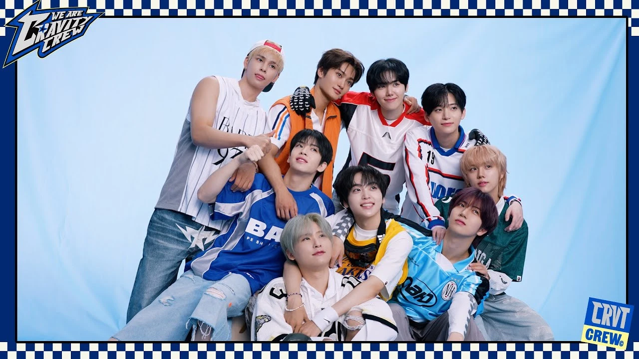 CRAVITY members gathered in a bright group promotional image