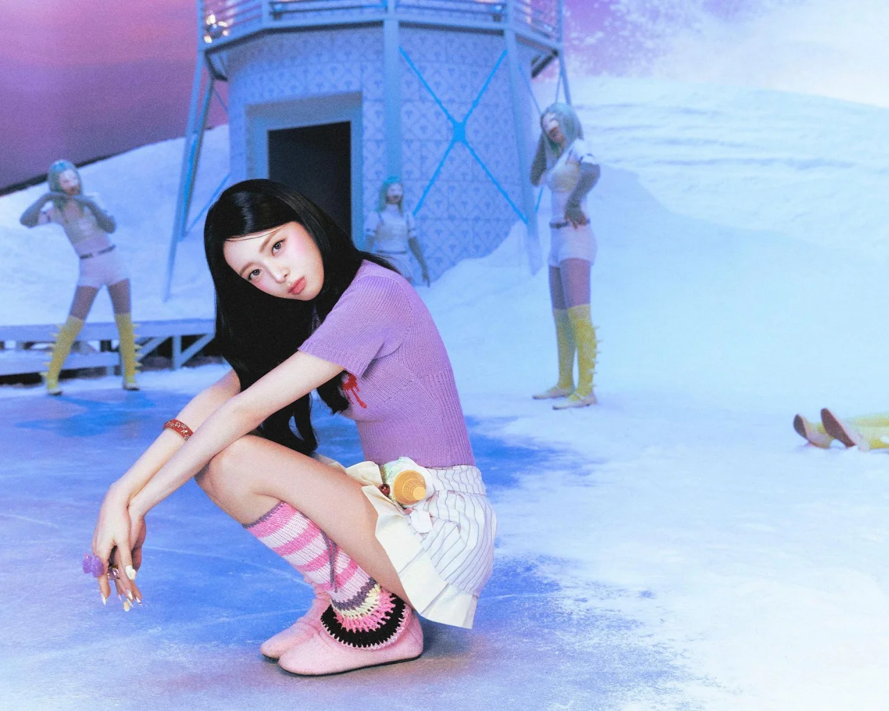 Yuna crouches in a pastel fantasy set for her Ice Cream promotional imagery