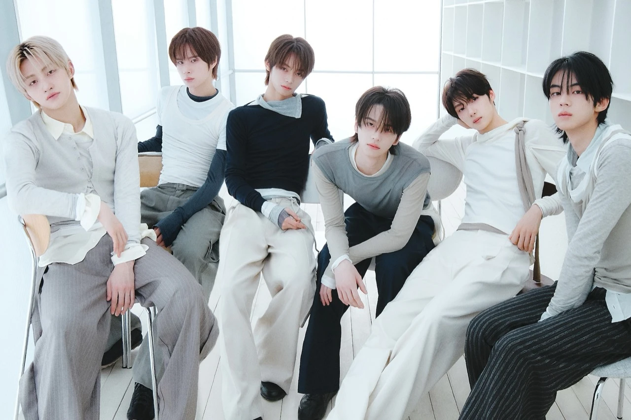 TWS pose together in an official studio promotional image