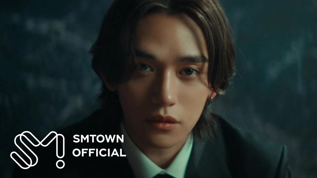 Lucas in a formal promotional portrait from an official SMTOWN video teaser