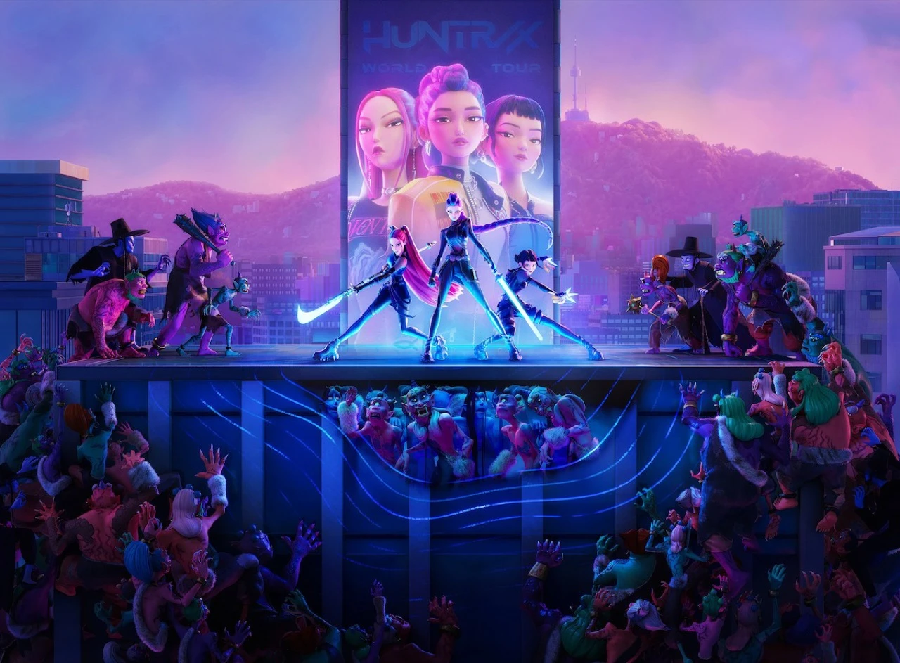 A rooftop battle still from Netflix's KPop Demon Hunters showing the film's heroine trio facing monsters under neon city lights