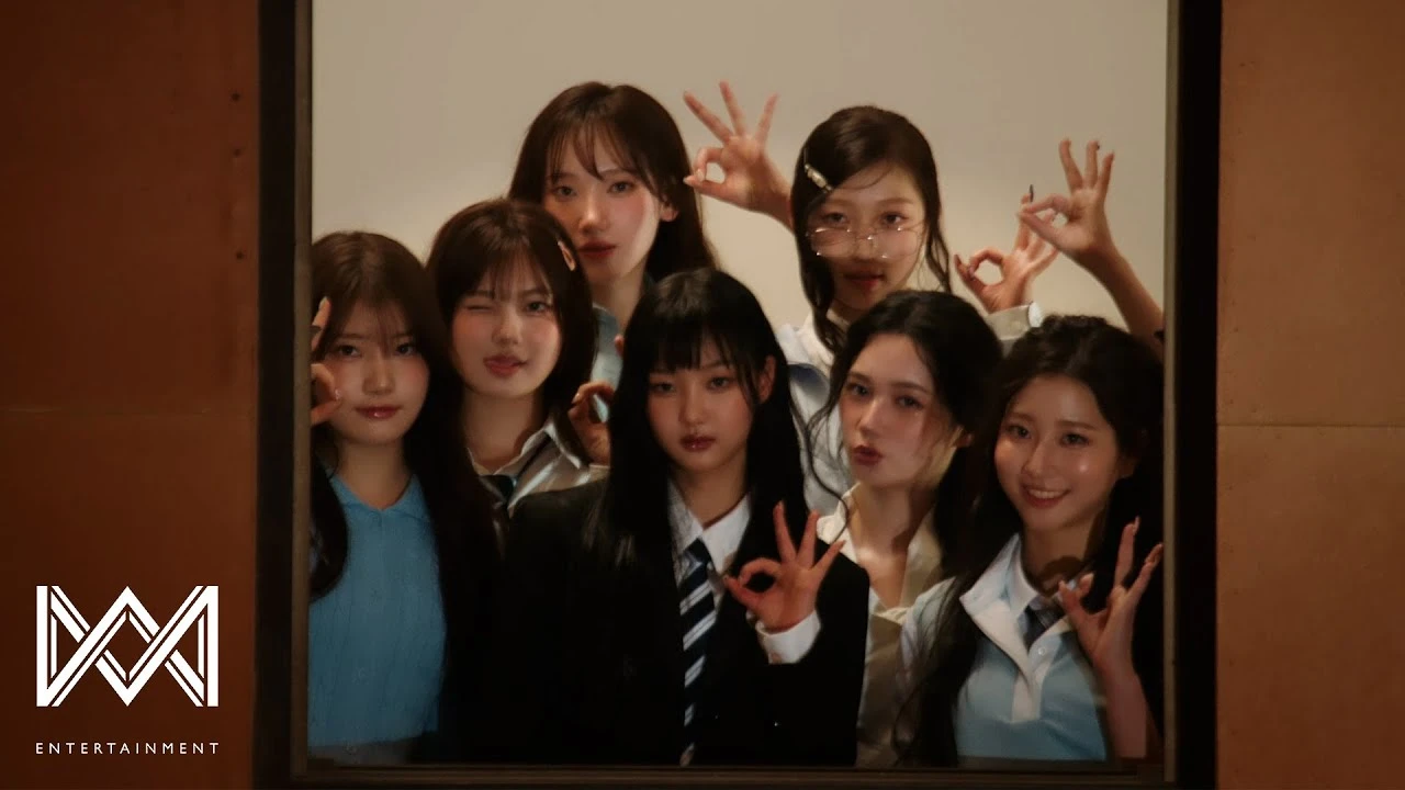 USPEER members appear together in a still from the official ZOOM music video thumbnail