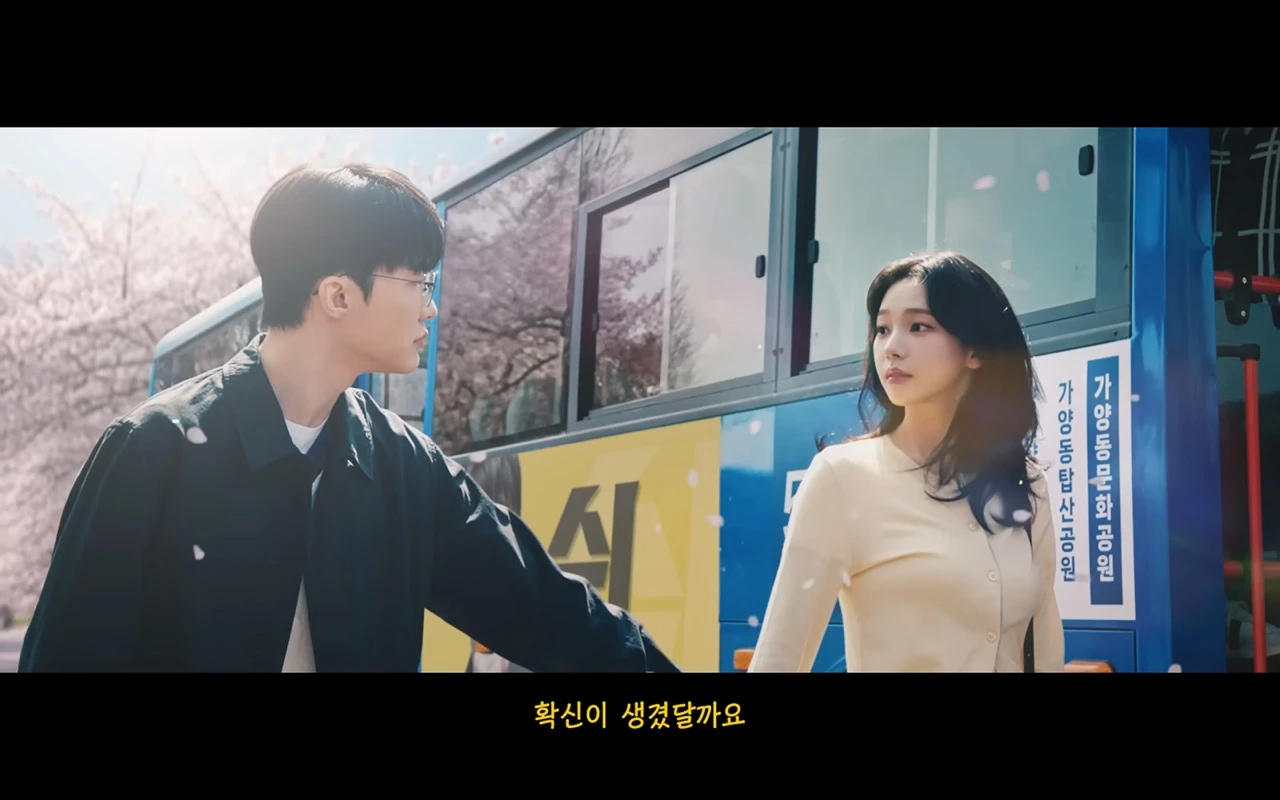 Faker and Karina face each other beside a bus in a scene from Google Play's PLAY ON PLAY teaser.