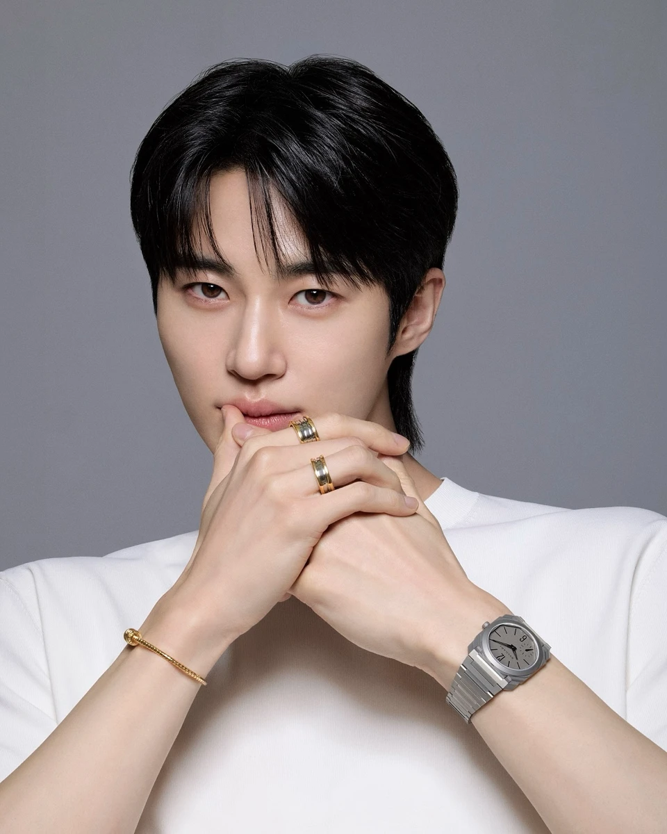 Byeon Woo-seok wearing BVLGARI rings, bracelet, and Octo Finissimo watch in an official portrait