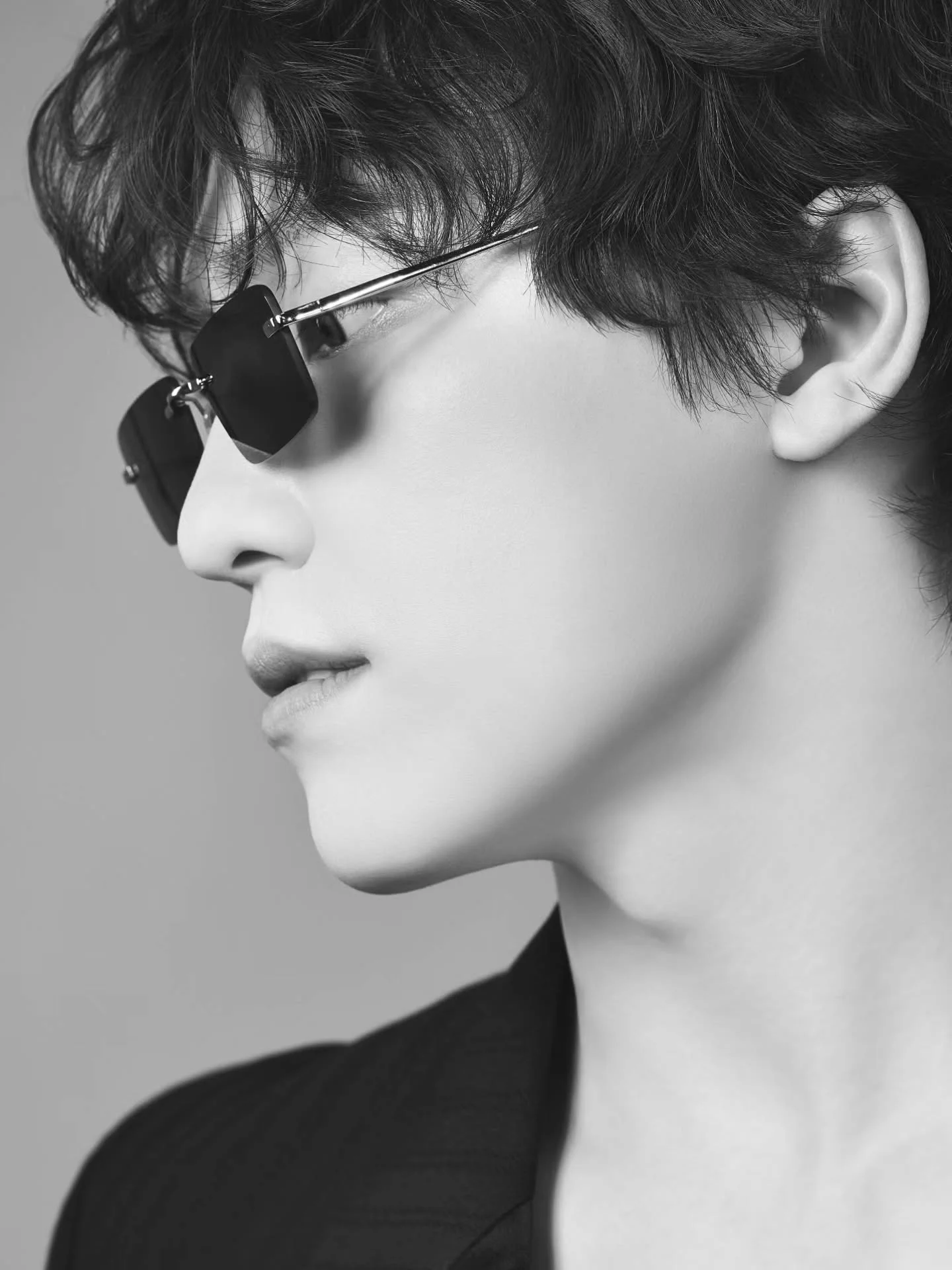 Close-up of Dino in character styling for Pi Cheolin from the official Monday Spotlight teaser
