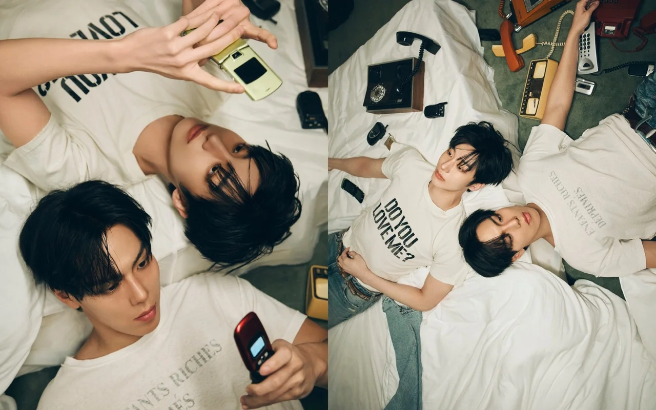 Shownu X Hyungwon lying among retro phones in a LOVE ME concept image